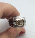 Picture of Sterling silver ring with gold setting with 9 diamonds 0.09pts with rope design size 10.5 10.3 gr . Pre owned . 845565-1