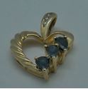 Picture of 10kt yellow gold heart pendant with 3 small diamonds and blue stones 2.4 grams  849283-3